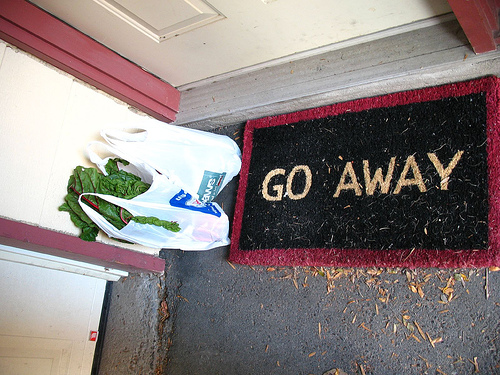 "Go Away" welcome mat