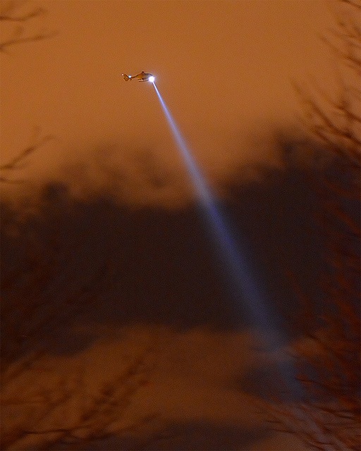 Helicopter shining beam of light